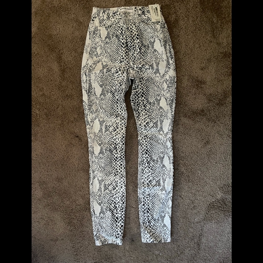 American Apparel Snakeskin jeans size 24; fits like petite